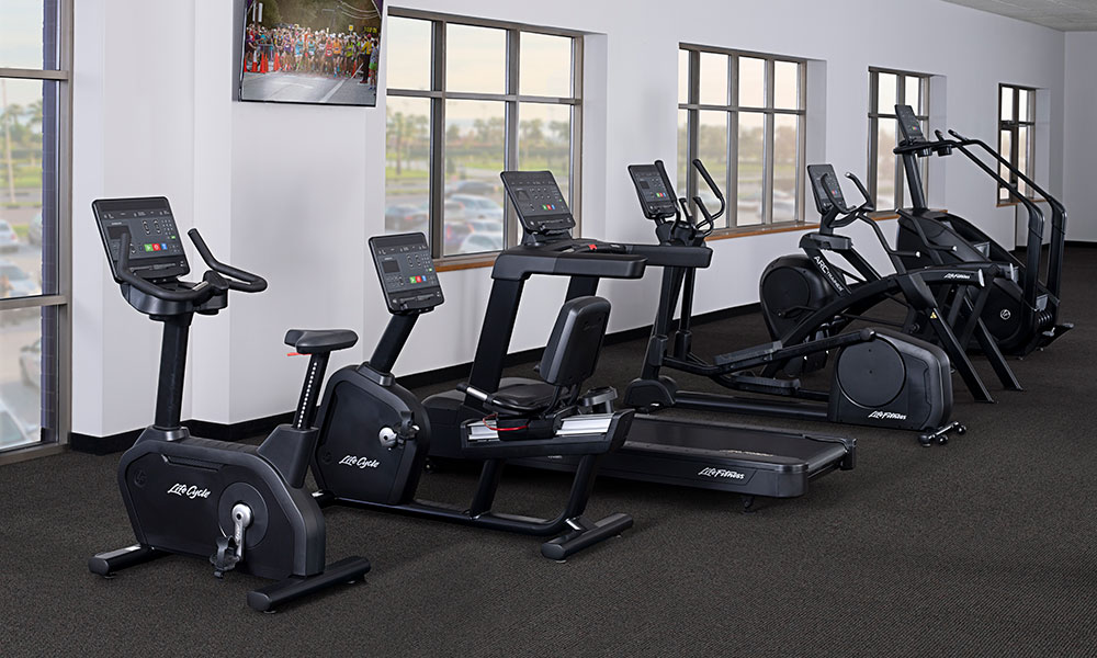 Row of cardio gym machines